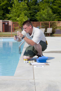 Swimming Pool Maintenance By Service man